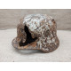 Battle damaged winter camo relic Helmet M35 