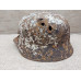 Battle damaged winter camo relic Helmet M35 