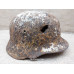 Battle damaged winter camo relic Helmet M35 